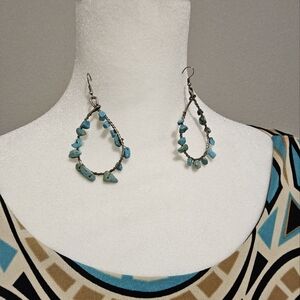 Teal and cream dress.